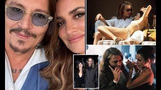 Penelope Cruz, 50, wraps her arm around Johnny Depp, 61, as they enjoy a Blow reunion 23 years