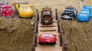 Disney toy cars on the bridge with crocodile funny | Disney toy cars transformer story collection