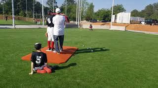 Leo Mazzone teaching how to throw a breaking ball.