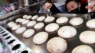 Amazing dough!  Popular glutinous sweet pancake, Korean bubble hotteok. / Korean street food