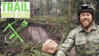 Building a backyard mountain bike trail: moving big rocks & first jumps!