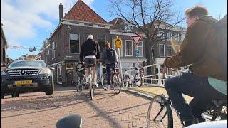 POV: twisting bike ride through Delft city center down to TU campus