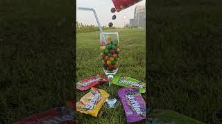 Filling Colorful SkittlesSour Candy's | on a Campaign Glass  #skittles #asmrsounds #shorts