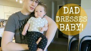 DAD DRESSES BABY!