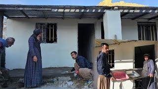 Razieh's happiness for bringing the sink and cementing the porch by Yousef