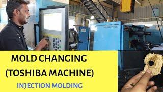 MOLD CHANGING INJECTION MOLDING MACHINE ( TOSHIBA )