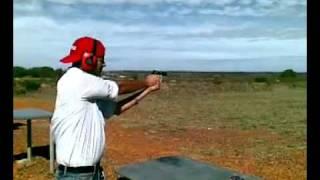 Firing the 9MM parabellum gun at Shooting Range