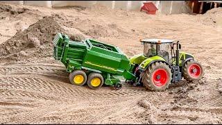 TRACTORS AND RC TRUCKS WORK HARD AT THE LIMIT