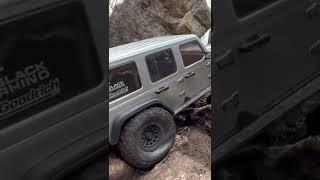 Axial SCX6 Rubicon pounding the rocks.