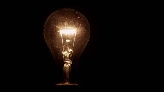 Stock Footage | Turning On And Turning Off A Classic Light Bulb | 4K