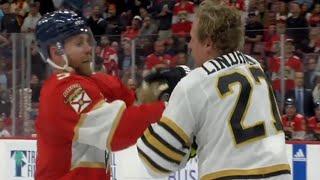 Sam Bennett bullies Hampus Lindholm into a fight