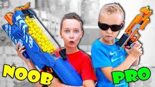 Mystery Box of NERF - Noob vs Pro Nerf Blasters Showdown