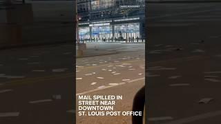Dozens of letters and broken postal totes were found scattered near the Enterprise Center Tuesday.