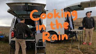 Cooking in the rain after an amazing long drive, Trees do not grow up here.