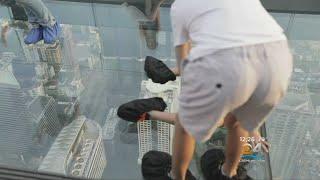 Glass Floor Opens Up On Tall Building