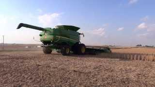 Combining beans with John Deere S680 & 635FD - view from the side/rear