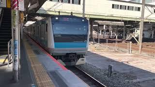 Keihin Tohoku Line E233 series, rapid express bound for Ofuna, passing by at Nippori station