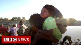 Ethiopia Tigray crisis: 'We came with the clothes on our backs' - BBC News