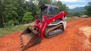 Grading with the New toy. First time running a skid steer #takeuchi