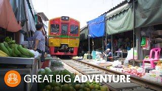 Watch a Train Run Through Thailand’s Most Dangerous Market