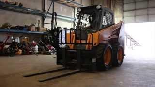 Mustang Skidsteer with Fork Rental Home Pros