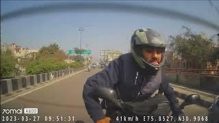 Biker crashes into the rear of a car: Dash cam footage