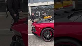 Offloading a Lamborghini Aventador Vorsteiner at the International Amsterdam Motor Show