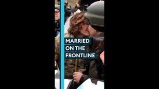 Ukrainian couple in military uniforms marry at Kyiv checkpoint #Shorts