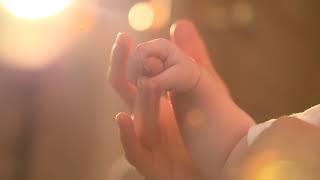 Mother Holding Baby's Hand - Copyright Free Stock Footage Clip