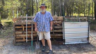 Pallet oak leaf composting bin inspection at around 30 days