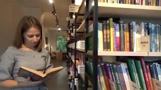 Cute girl in a Library - Non Copyrighted Video - HD Stock Footage