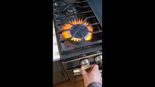 Why is my gas burner flame orange and yellow?