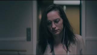 UNIDENTIFIED WOMAN - Melanie Scrofano