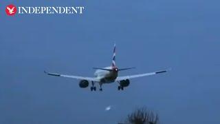 Plane struggles to land at Heathrow as Storm Darragh hits UK