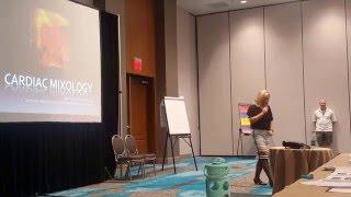 John Bielinski playing a joke on Jennifer Carlquist at the CME4Life Heart of Cardiology Conference