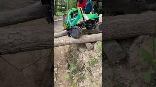 AVIA DAEWOO 4X4 TRAIL TRUCK DRIVE OVER 2 TRUNKS AND SLIPPED OVER THE FRONT BUT HE GET BACK ON TRACK!