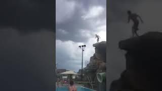 Kid Jumps Off Into Pool From Restricted Area And Gets Kicked Out