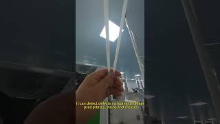 Drinking straw loading and inspection machine