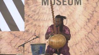 Amadou Kouyate performs at International African American Museum dedication ceremony