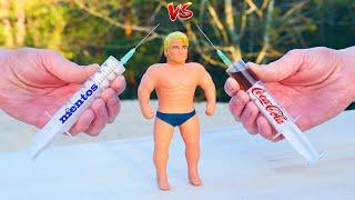 Experiment: Stretch Armstrong vs Coca Cola and Mentos