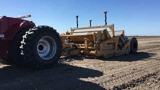 TOOMEY 4500C Scraper loading using teeth edges at speed, typically around 10 kph (6 mph).