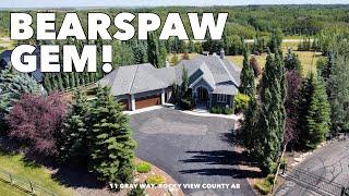 Pristine Bearspaw Acreage with a Pond!