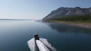 The Great Bear River meets the Mackenzie river in front of Bear Rock by Tulita, NT