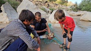 Rural fisherman men.  Babak and Ali went fishing on a hot summer day