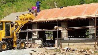 The man worked hard for 6 months to renovate old house in the mountains