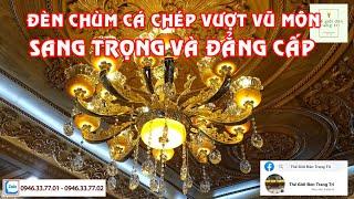 Thế Giới Đèn Trang Trí l Đi lắp đặt đèn chùm phòng khách 15 tay cá chép cho khách hàng sang trọng