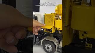 Custom 8x8 mixer truck we’ve built – a modified roll-on/off truck with a mixing drum!