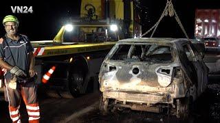 VN24 - Remains of a burnt-out VW Golf are recovered