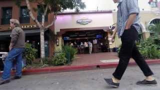 Korean Dude Walking down The Street with A Cup of Starbucks Coffee