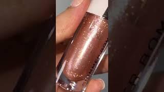 SHIMMER BOMB LIPGLOSS from makeup revolution 